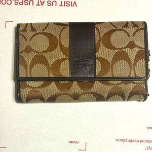 COACH women’s folding wallet with logo